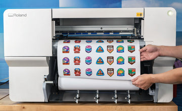 Roland UV printer printing colorful stickers