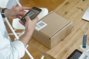 Scanning QR code sticker on package